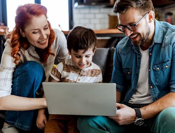 family viewing laptop and arranging a free consultation